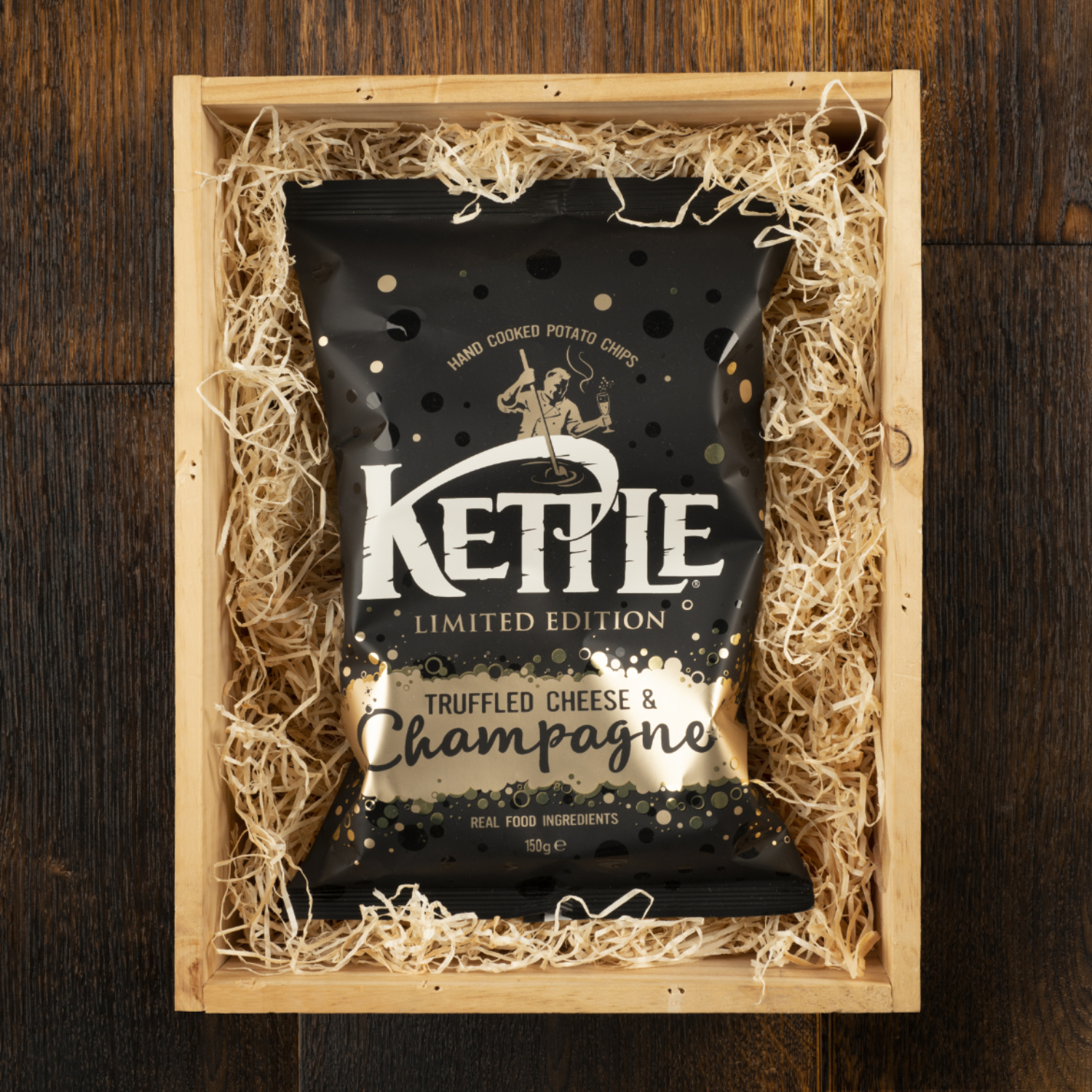 Kettle_Truffled_Cheese_and_Champagne_Bag_inside_a_wine_crate