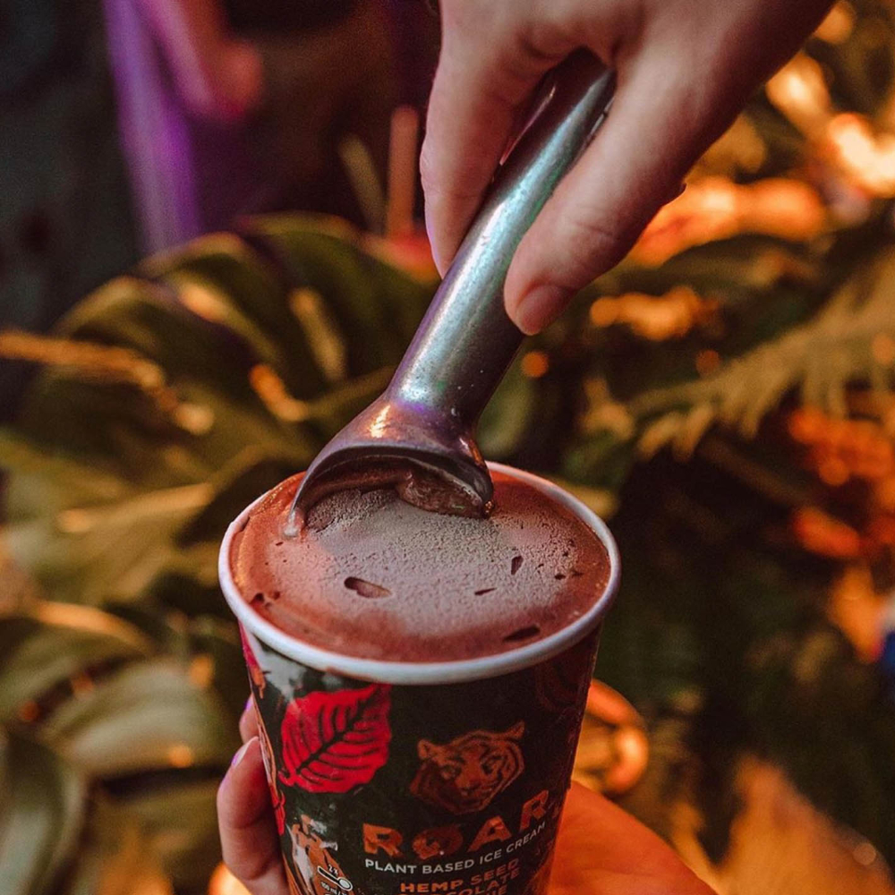 Taking a scoop of Roar ice cream